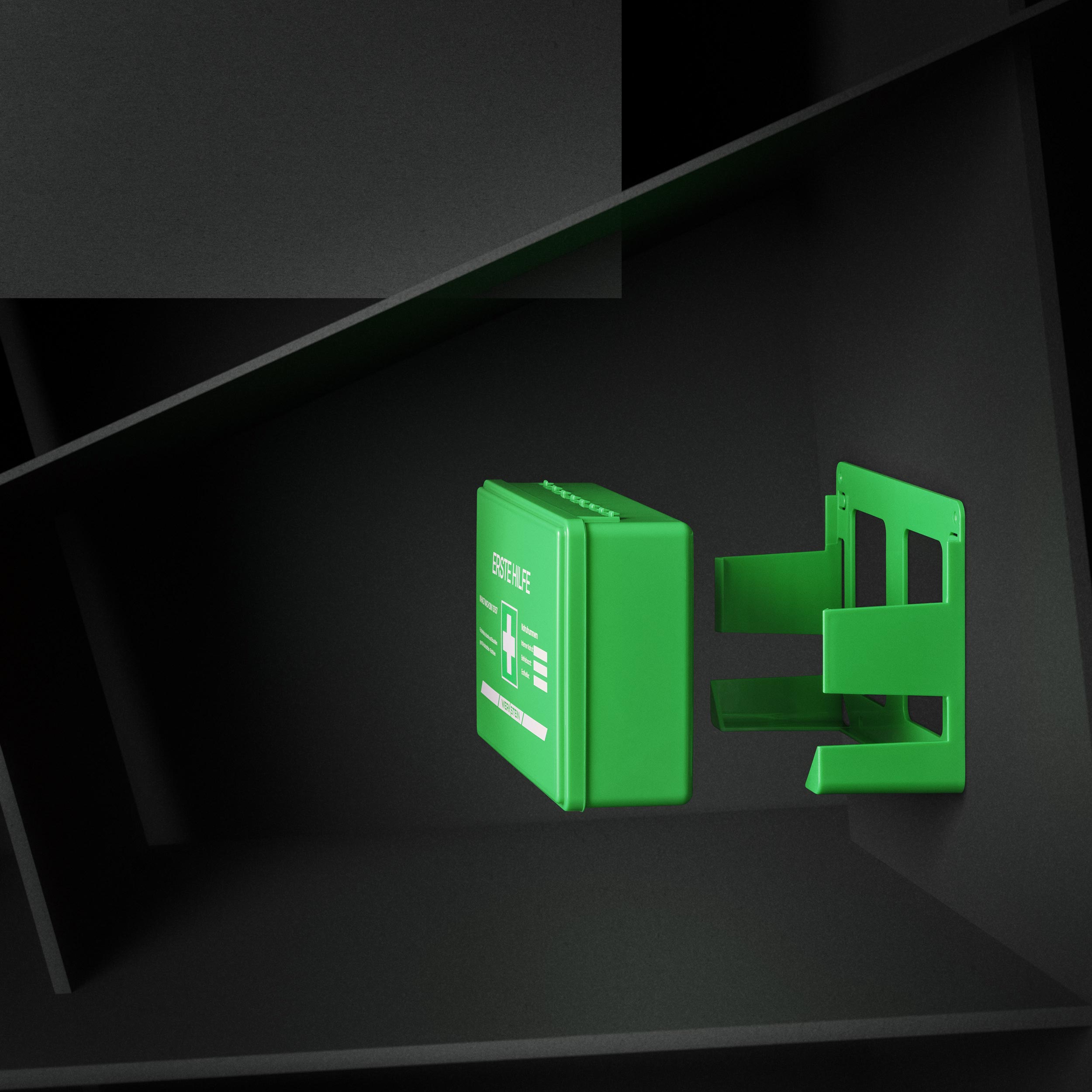 Kompakter Erste-Hilfe-Koffer DIN 13157 grün, aus der Wandhalterung herausnehmbar